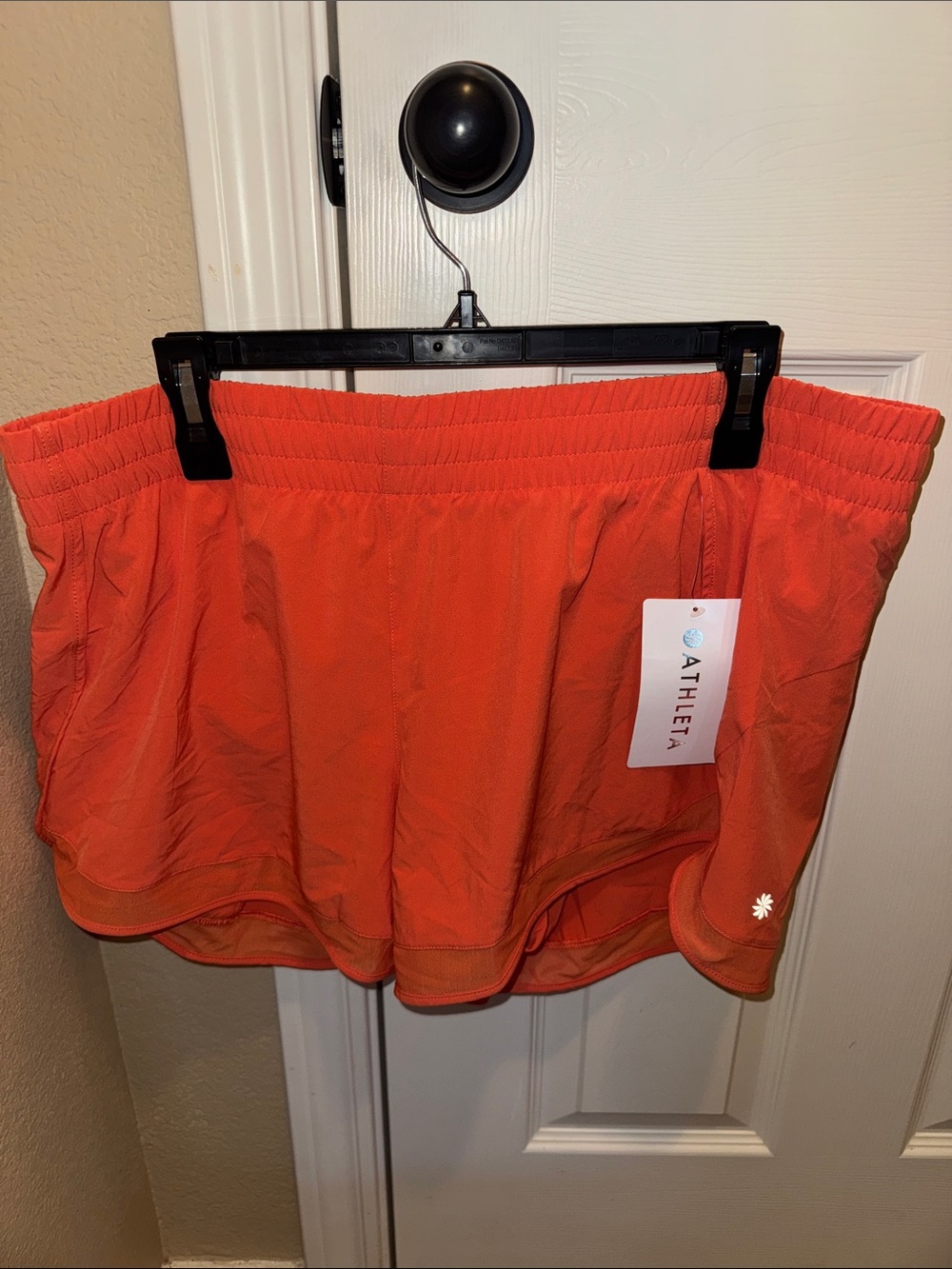 BNWT Athleta Bright Orange Shorts with Built-In Liner 
Mesh Racer Run 4” Shorts